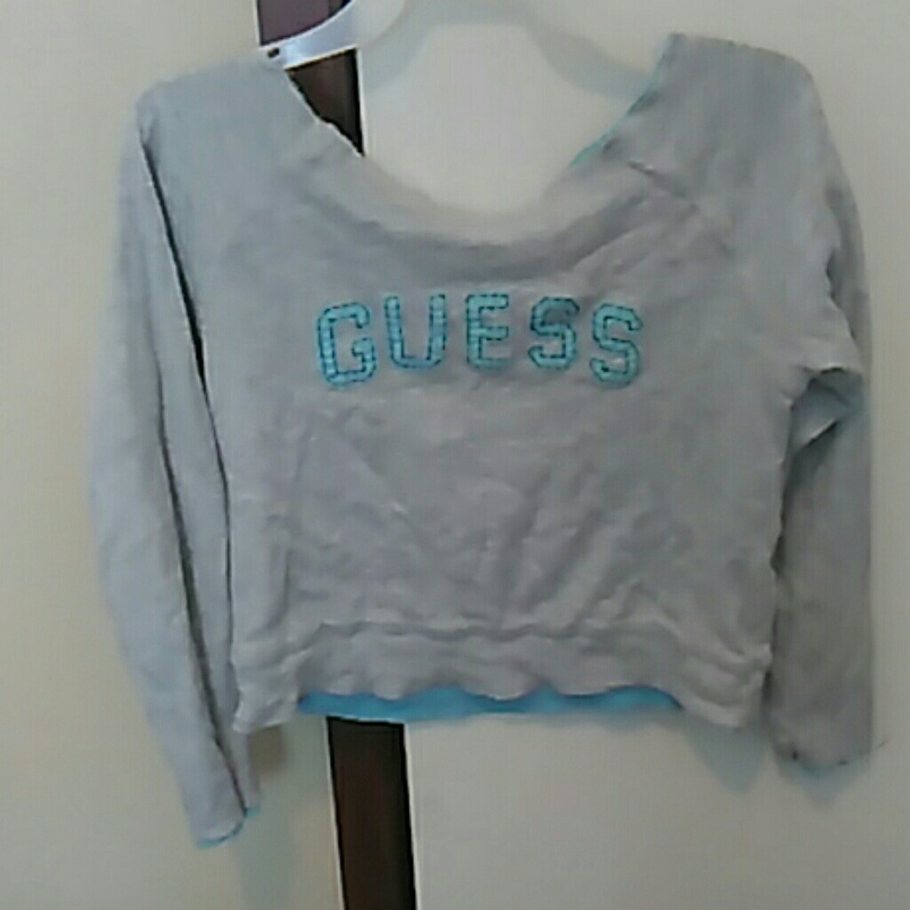 Long sleeve into he shoulder crop top brand guess